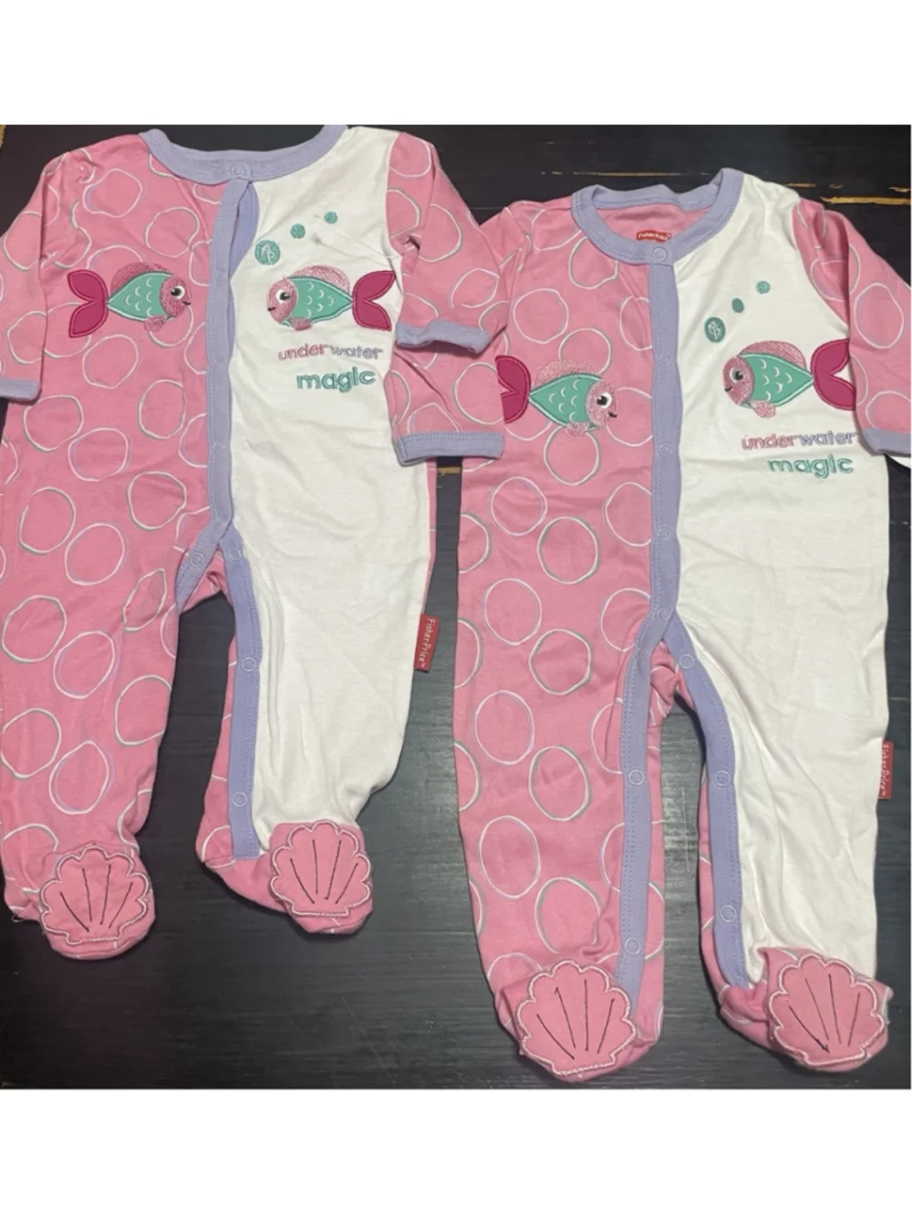 2 Twin Fisher price NWT Girls Twin Sleepers 6-9 Months!